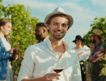 a group of friends touring a vineyard